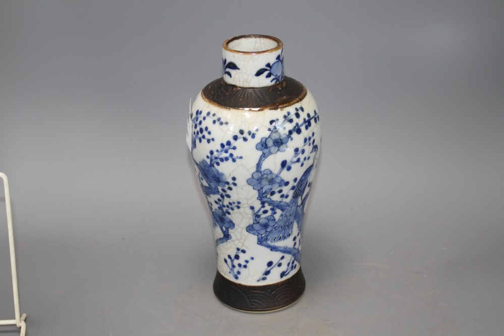 A Chinese crackle glaze baluster vase, decorated with peacocks and prunus blossom, height 25.5cm